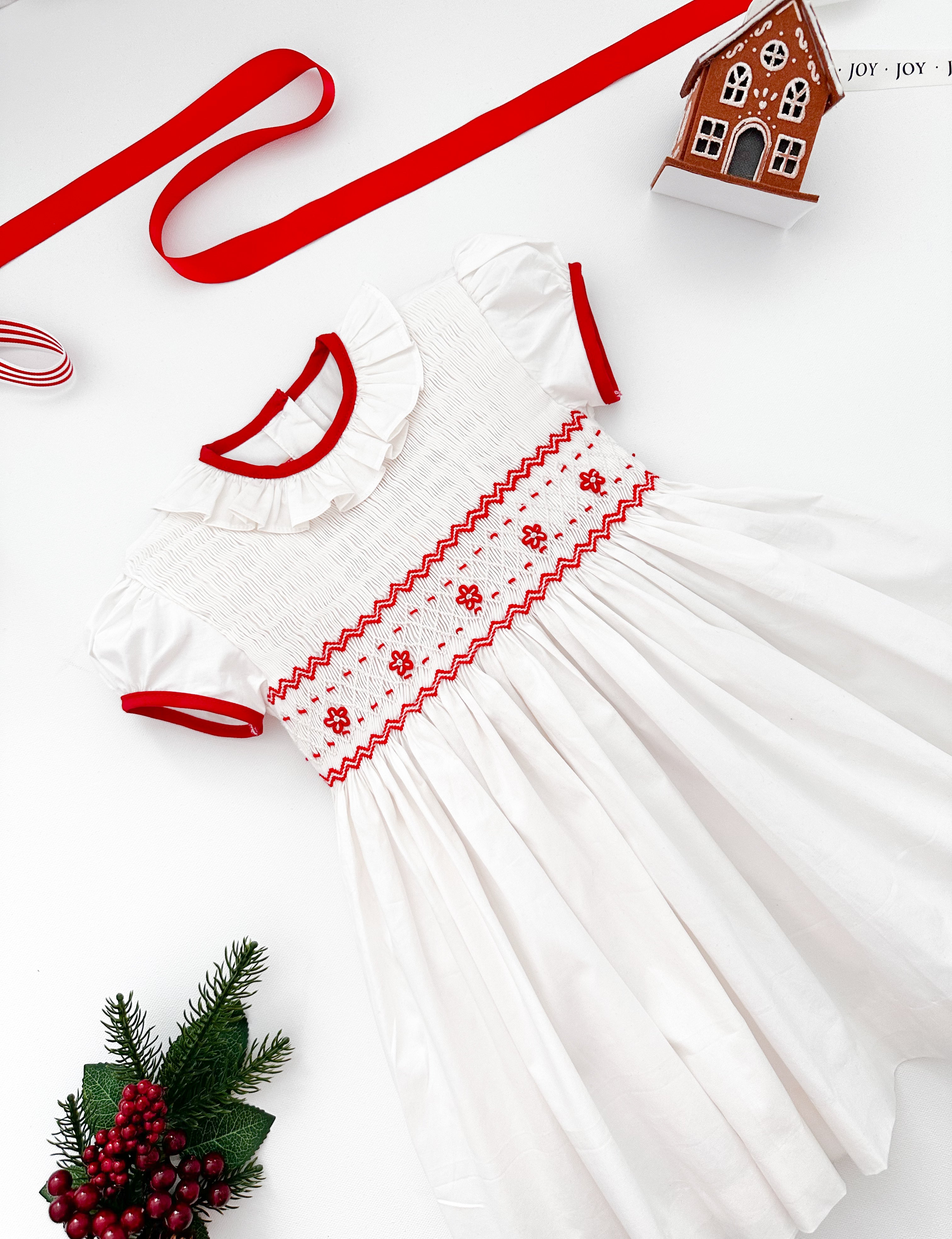 The hand smocked BENEDICTE dress - in white and red