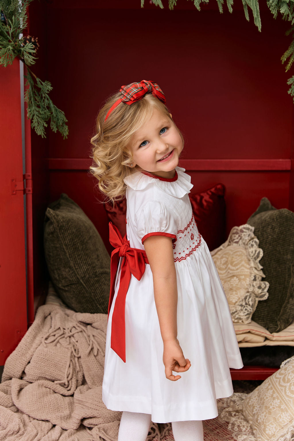 The hand smocked BENEDICTE dress - in white and red