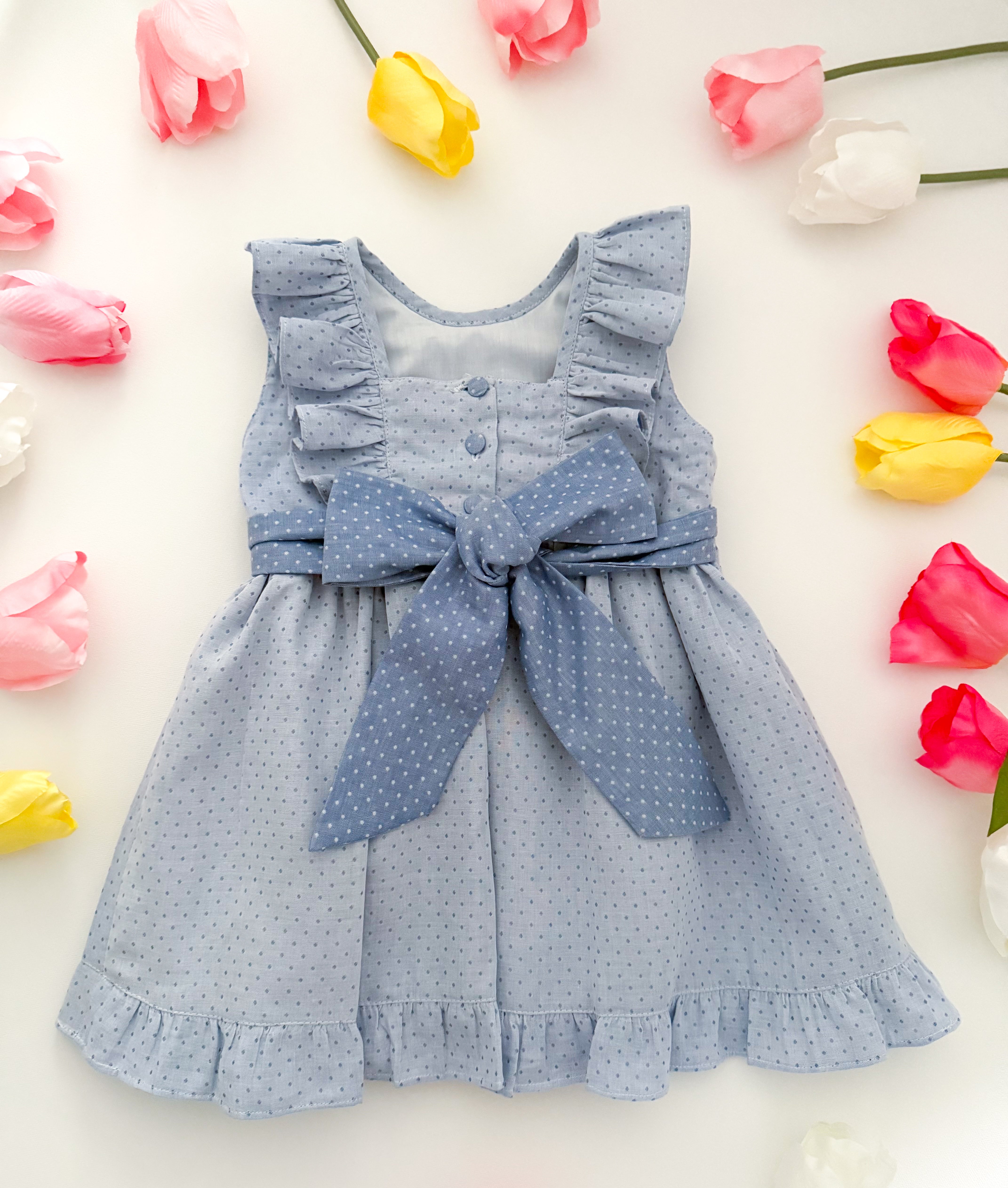 The hand smocked MIRANDA dress - Blue polka dots